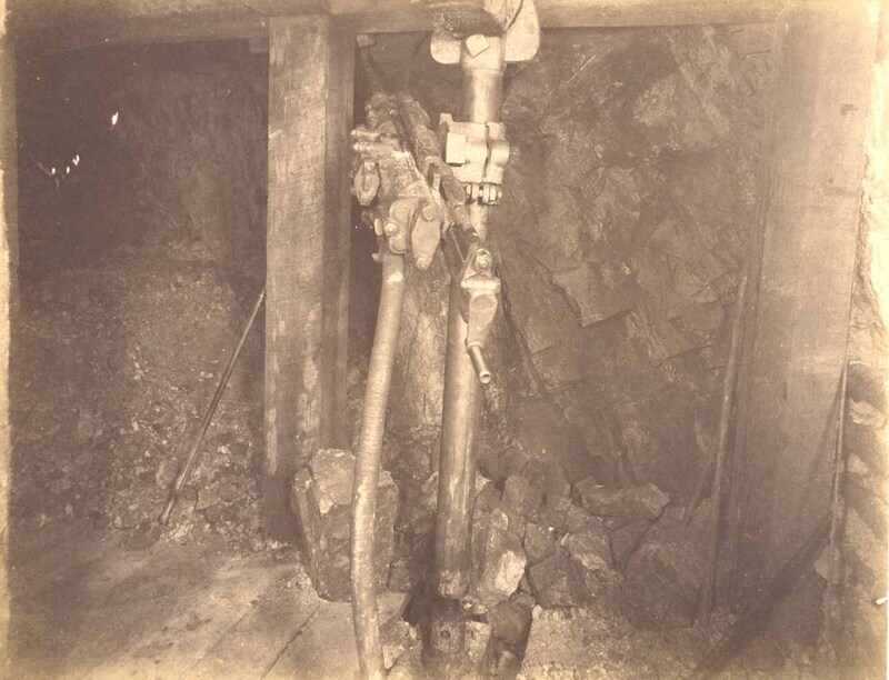 Mountain Consolidated Mine 550 level East sill floor.  Showing drilling machine drilling ore breast . Ore 45 ft.